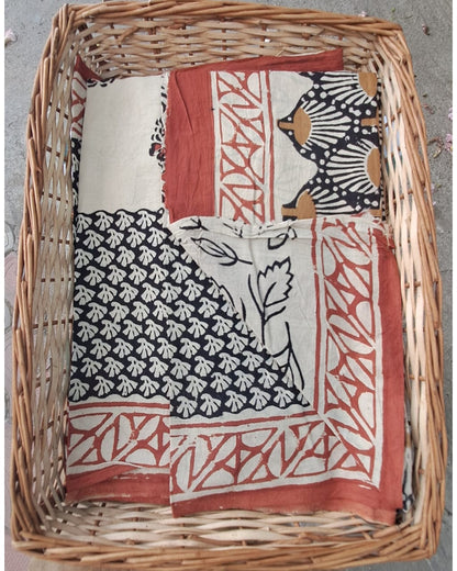 CREAM HANDBLOCK MULMUL SAREE