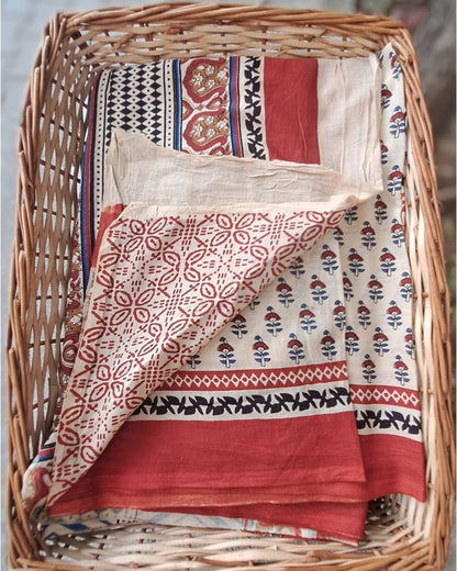 CREAM HANDBLOCK MULMUL SAREE