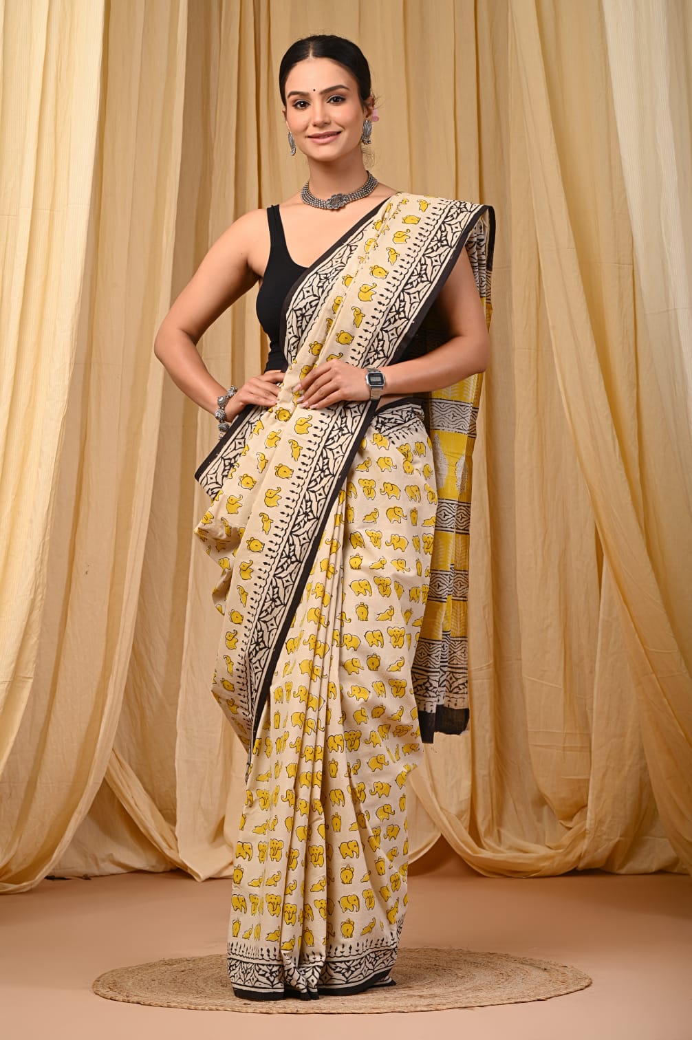 CREAM HANDBLOCK MULMUL SAREE